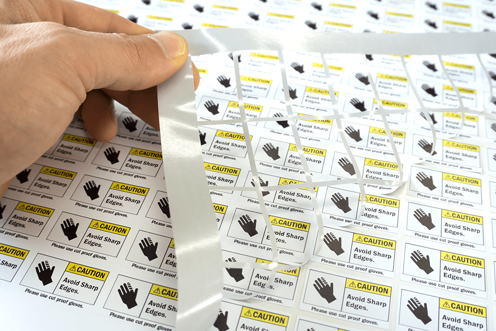 how to get labels to stick to plastic